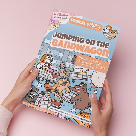 Hand holding a printed copy of the Bandwagon Effect logical fallacy activity pack showing the cover and print quality