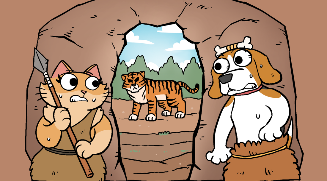 Duchess and Bruno in prehistoric cave-dweller outfits grip their spear and freeze in fear as a menacing tiger blocks the entrance to their cave